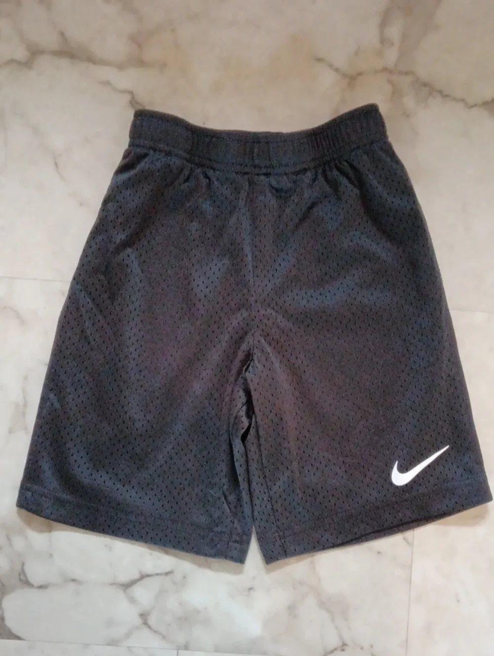 Nike Black Kids Mesh Athletic Shorts with White Swoosh